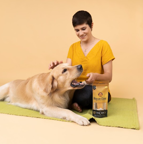 Women Serving Dog with Treat